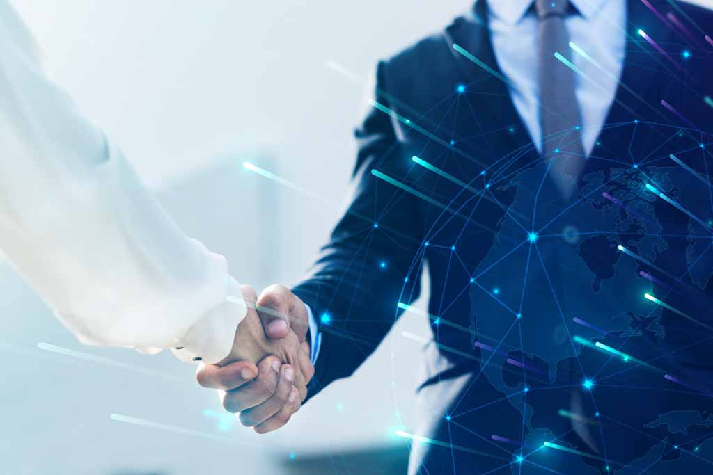 Corporate business handshake between partners Corporate business handshake between partners